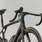 TREK MADONE SLR 9 AXS ROAD BIKE 2025 MATTE CARBON SMOKE/PRISMATIC PEARL